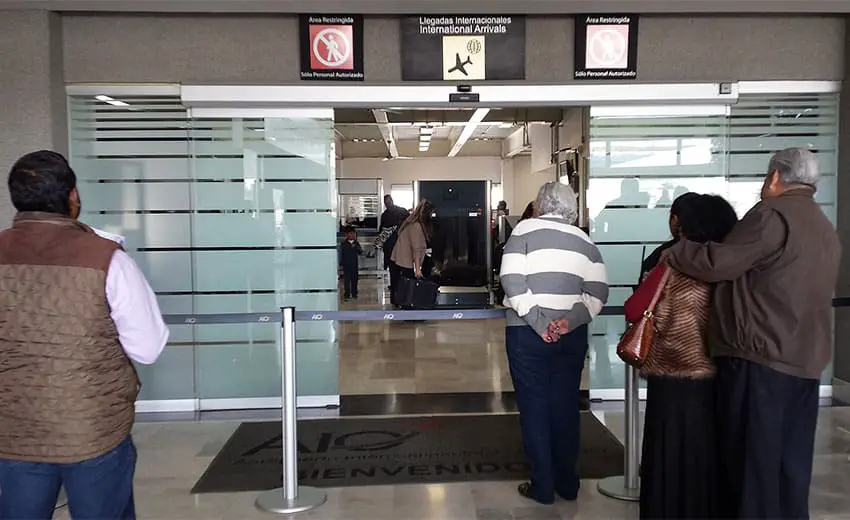 People waiting for passengers at the international arrivals area of Queretaro International Airport