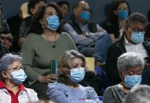 People wearing face masks in Mexico, where COVID cases are increasing