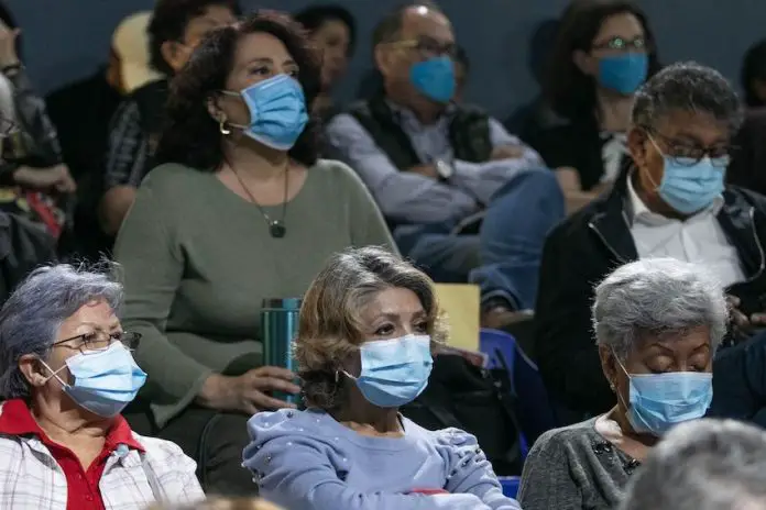 People wearing face masks in Mexico, where COVID cases are increasing