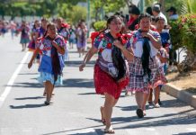 Women of all ages wearing huipiles and other traditional garments run in the Coapan, Puebla, Tortilla Race.