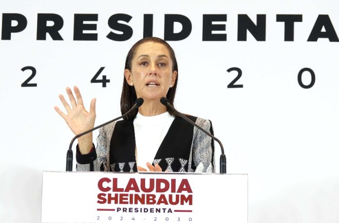 President-elect Claudia Sheinbaum at a podium