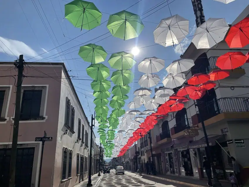 Street in Calvillo with decorative umbrellas.