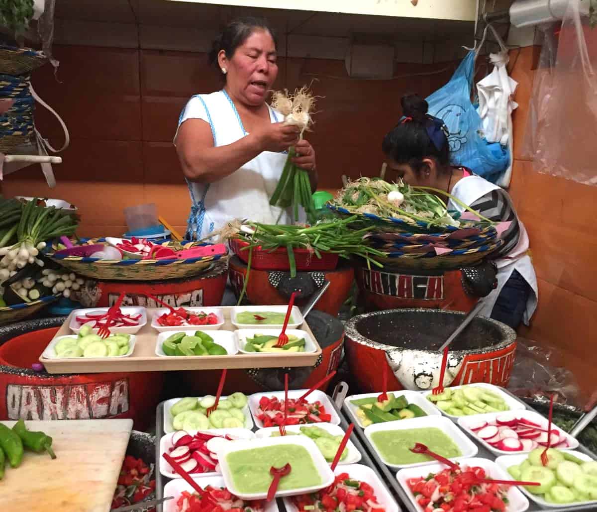 Mexican woman in a market preparing food