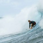 Mexican surfer Alan Cleland catches a wave.
