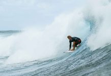 Mexican surfer Alan Cleland catches a wave.