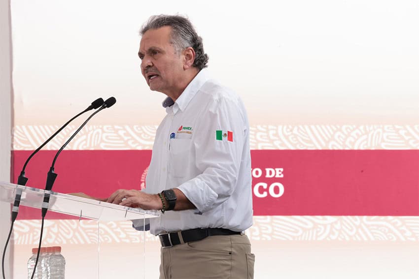 Pemex CEO Octavio Romero speaks at a podium during an event at the Olmeca Refinery in Dos Bocas.