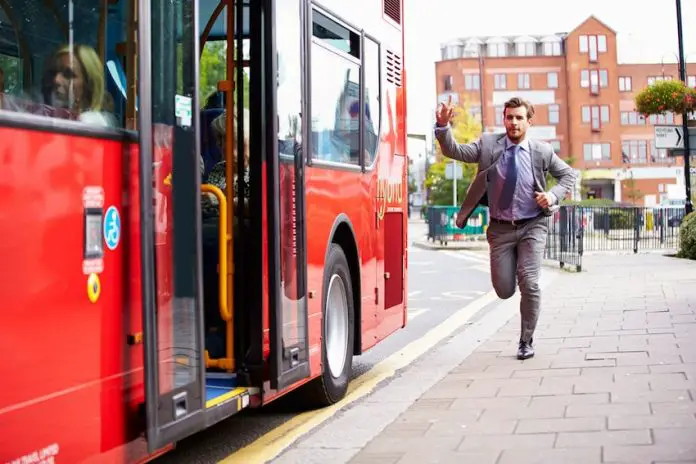 Man chasing a bus