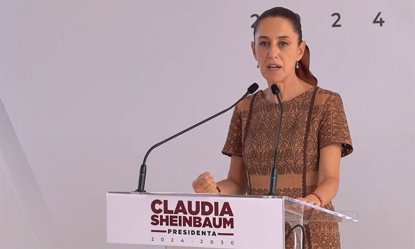 Claudia Sheinbaum speaks at a podium