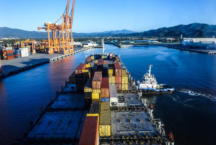 aerial view of a container ship entering the port of Manzanillo, Colima