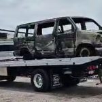 The burned van in which the migrants were traveling before they were attacked in Sonora