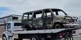 The burned van in which the migrants were traveling before they were attacked in Sonora