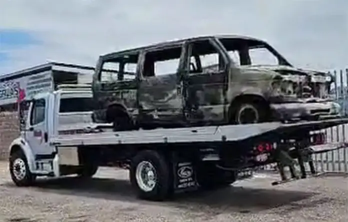 The burned van in which the migrants were traveling before they were attacked in Sonora