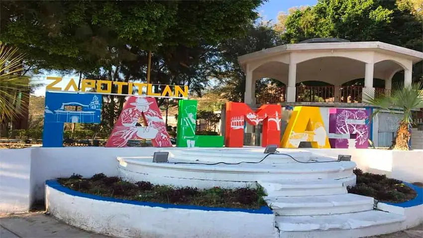 A sign for Zapotitlán Palmas, Oaxaca, the town where the fugitive was found.