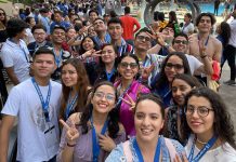 Large group of students take selfie at the 2023 Congress of the Dolphin Program.