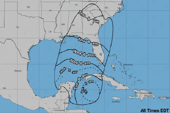 Map of southeastern coast of United States and eastern Caribbean coast showing Mexico, Belize and Guatemala, with radii predicting the earliest reasonable times for the arrivaal of tropical storm force winds.