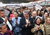 Deputy Ricardo Monreal stands at the front of a crowd celebrating the passage of the judicial reform bill in Mexico's Chamber of Deputies