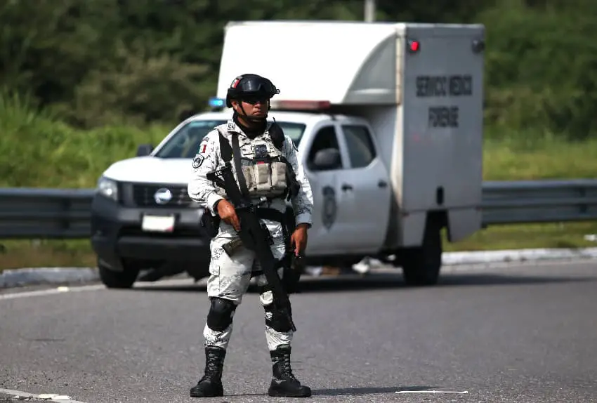 National Guard member on at a crime scene in Morelos