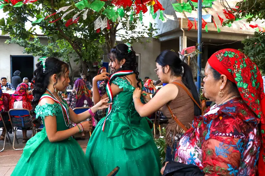 Women prepare for an Independence Day celebration in Oaxaca