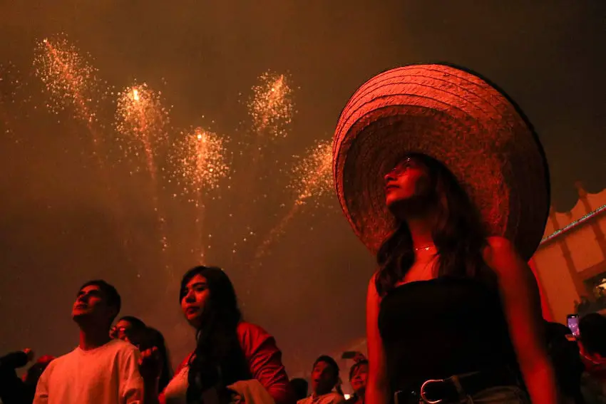 People look up at fireworks display in Zacatecas