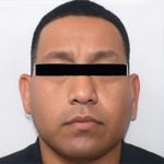 Police mugshot of Carlos Alberto Monsivais Trevino with a black rectangle over the image of his eyes in order to disguise his identity.