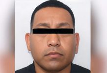 Police mugshot of Carlos Alberto Monsivais Trevino with a black rectangle over the image of his eyes in order to disguise his identity.