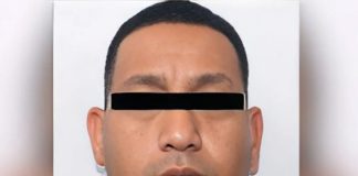 Police mugshot of Carlos Alberto Monsivais Trevino with a black rectangle over the image of his eyes in order to disguise his identity.