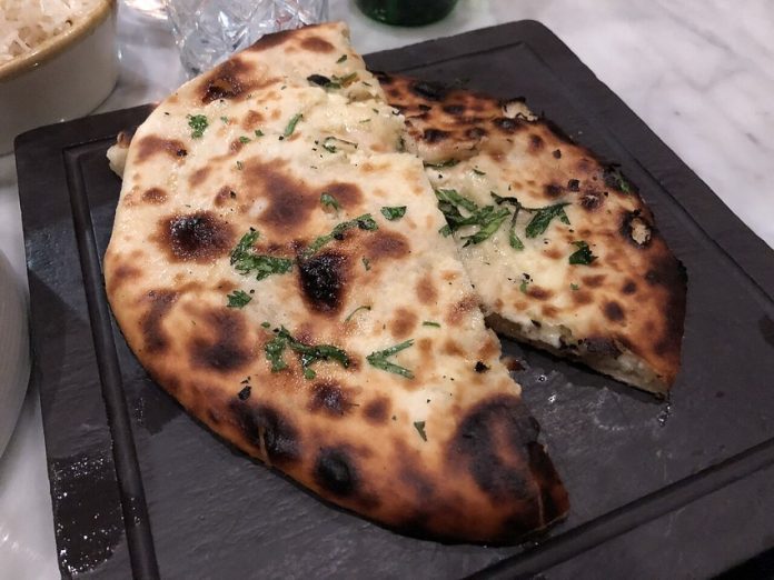 Cheese-stuffed naan bread, which can use queso Oaxaca