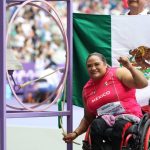 Zarza rings the champions bell after winning Mexico's first gold medal at the Paris Paralympics.