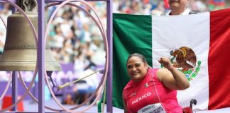 Zarza rings the champions bell after winning Mexico's first gold medal at the Paris Paralympics.