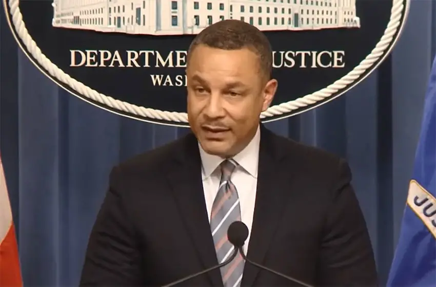 U.S. prosecutor Breon Peace speaks at a microphone