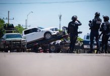 Sinaloa state police impound a white SUV