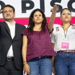 Luisa María Alcalde salutes at her swearing-in as Morena's new party leader