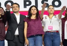 Luisa María Alcalde salutes at her swearing-in as Morena's new party leader