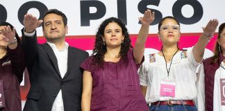 Luisa María Alcalde salutes at her swearing-in as Morena's new party leader
