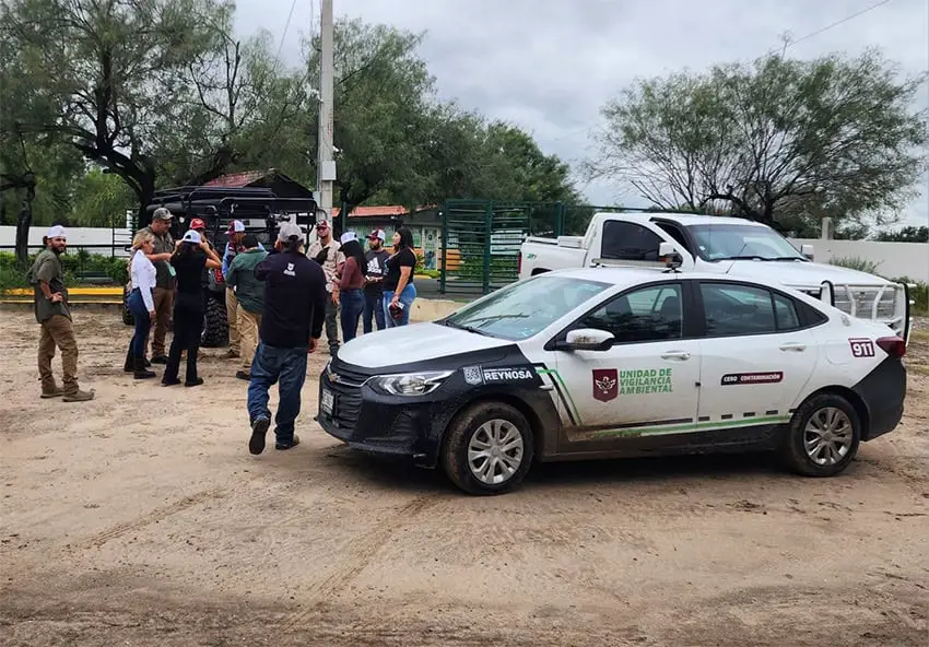 Officials gather outside Quinta La Fauna zoo in Reynosa, Tamaulipas, to search for an escaped tiger