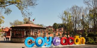 Monumental letters spelling "Coyoacán" in the neighborhood's central plaza. Coyoacán guide.