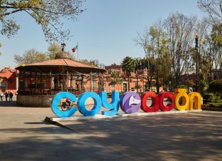 Monumental letters spelling "Coyoacán" in the neighborhood's central plaza. Coyoacán guide.