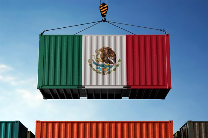 Illustration of shipping container painted with image of Mexican flag being lifted in the air by a crane, representing nearshoring in Mexico