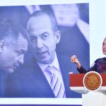 President Claudia Sheinbaum stands at a podium in front of a photo of Felipe Calderón and Genaro García Luna.