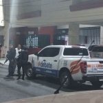 Police stand in front of the El Debate headquarters in Culiacán, Sinaloa