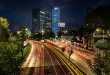 Nighttime light sweep on an avenue in Colonia Condesa in Mexico City