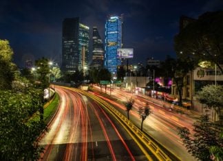 Nighttime light sweep on an avenue in Colonia Condesa in Mexico City