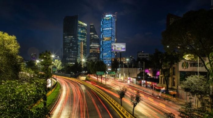 Nighttime light sweep on an avenue in Colonia Condesa in Mexico City