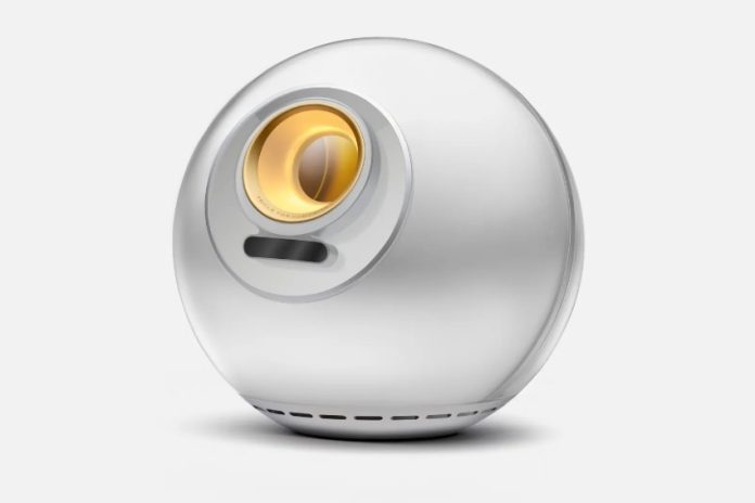 A Worldcoin orb, a white device used to scan people's irises and collect biometric data.