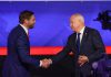 JD Vance and Tim Walz at the vice presidential debate shaking hands before they begin