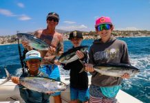 A family out tuna fishing in Cabo San Lucas