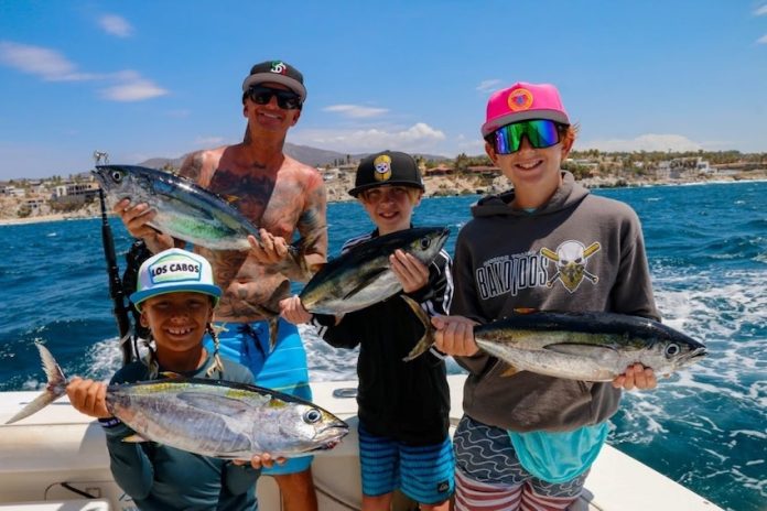 A family out tuna fishing in Cabo San Lucas