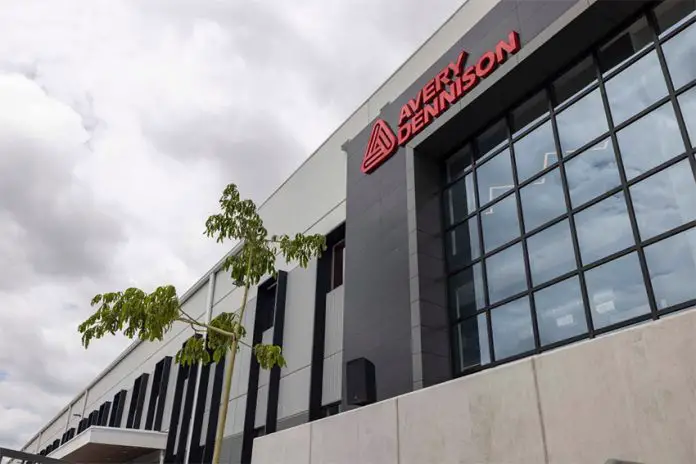 The entrance to Avery Dennison's new plant in Querétaro, showing the company name in red letters