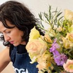 A woman at a flower arranging class in Mexico City