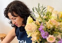 A woman at a flower arranging class in Mexico City